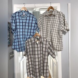 A group of men’s 3 xl button down shirts